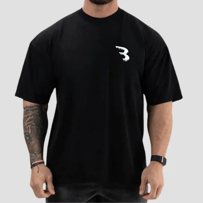 Camiseta Oversized Masculina, Camiseta Oversized para Academia, Camiseta Oversized de Algodão, Camiseta Oversized Fitness Masculina, Camiseta Oversized CBUM, Camiseta Oversized Respirável, Camiseta Oversized Casual Esportiva, Camiseta Oversized Confortável.