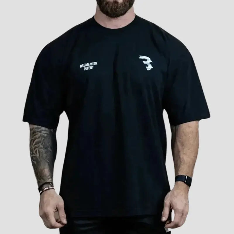 Camiseta Oversized Masculina, Camiseta Oversized para Academia, Camiseta Oversized de Algodão, Camiseta Oversized Fitness Masculina, Camiseta Oversized CBUM, Camiseta Oversized Respirável, Camiseta Oversized Casual Esportiva, Camiseta Oversized Confortável.