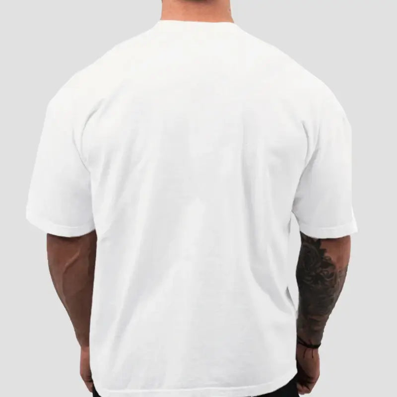 Camiseta Oversized Masculina, Camiseta Oversized para Academia, Camiseta Oversized de Algodão, Camiseta Oversized Fitness Masculina, Camiseta Oversized CBUM, Camiseta Oversized Respirável, Camiseta Oversized Casual Esportiva, Camiseta Oversized Confortável.