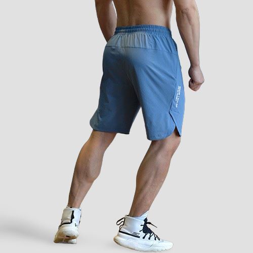 Short de tactel azul da Iron Club, desenvolvido para atletas de Men's Physique, com foco no caimento e design traseiro.