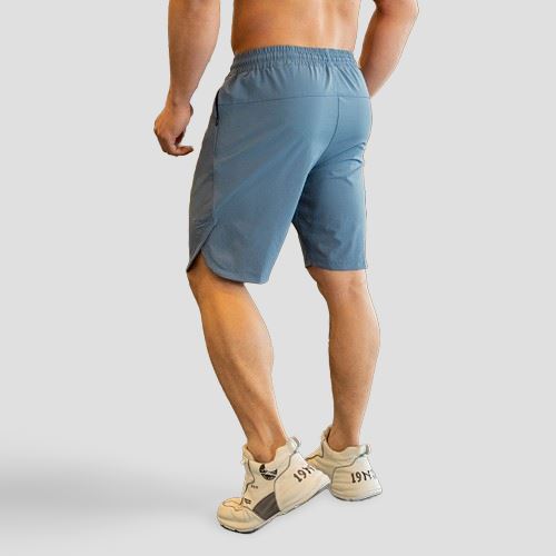 Vista de costas do short masculino para Men's Physique, exibindo o caimento e o design da parte traseira.